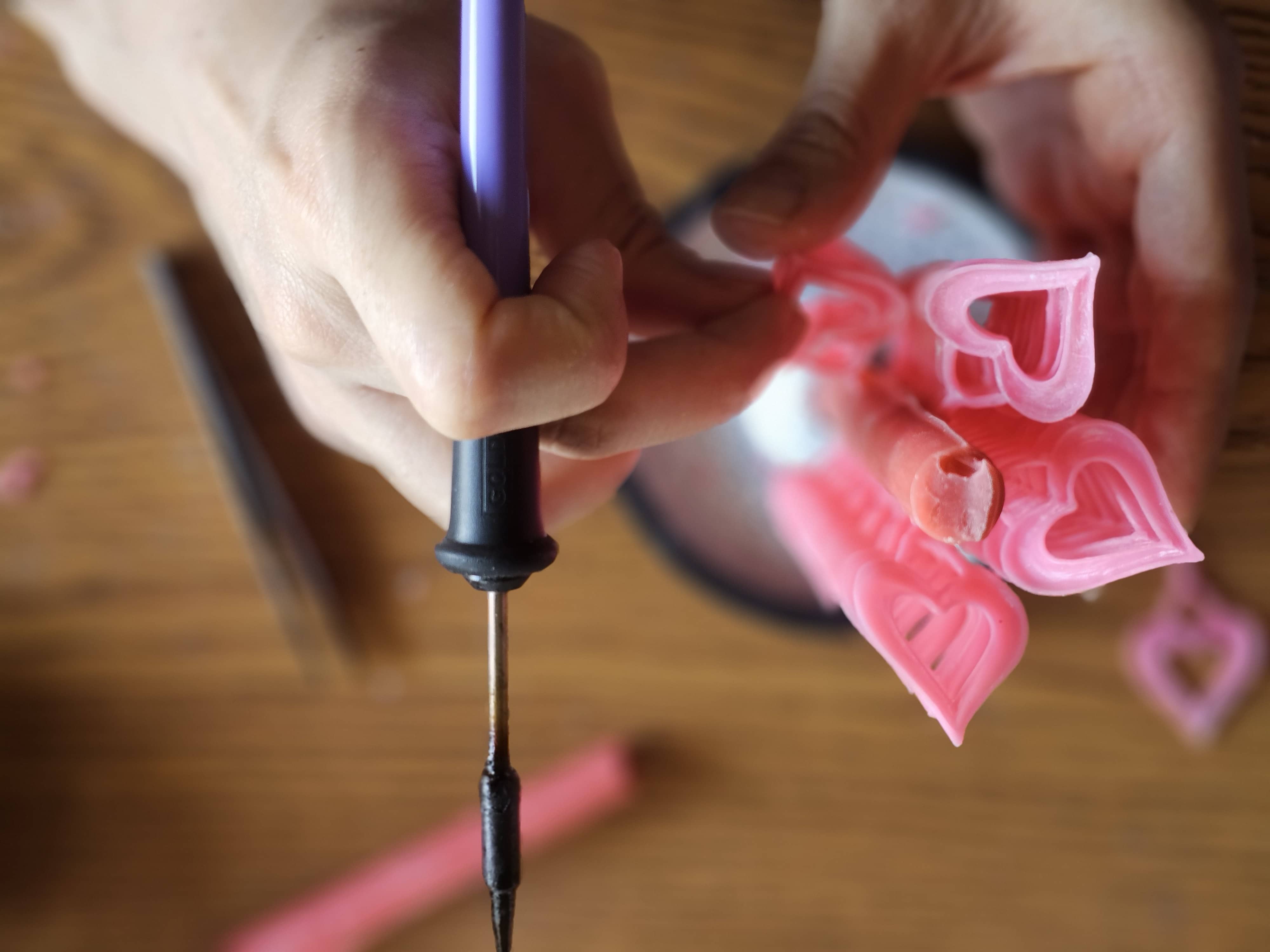 Top view of a pink wax tree assembled from hand-carved models